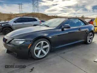 ✅ 2010 BMW 6 Series 650i • VIN: WBAEB5C54AC225989 • Лот: 89709095. Опубликован ранее на Copart с пробегом 99 928 миль. Бесплатный доступ к архиву аукционных продаж из США и подробный отчёт об истории автомобиля на DreamBid. Изображение 1.