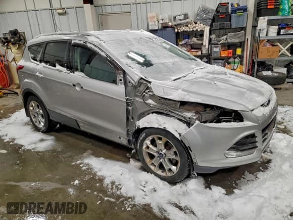 ✅ 2015 Ford Escape Titanium • VIN: 1FMCU9J9XFUA72632 • Lot: 95184785. Listed on Copart with 195,877 mi. Free auction sales archive from the USA and detailed vehicle history report at DreamBid. Image 4.