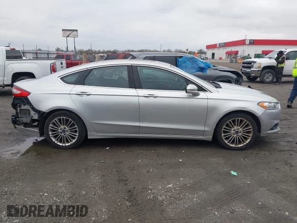✅ 2016 Ford Fusion SE • VIN: 3FA6P0H91GR155925 • Lot: 43828321. Listed on IAAI with 245,423 mi. Free auction sales archive from the USA and detailed vehicle history report at DreamBid. Image 13.