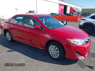2012 Toyota Camry XLE with VIN 4T1BD1FK9CU041148, listed as a IAAI auction lot 43290618 with 100,060 mi miles and . Bid and sale history available at DreamBid. Image 1.