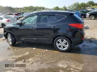 2013 Hyundai Tucson GLS z VIN KM8JUCAC5DU739345, wystawiony jako Copart lot #71053304 z przebiegiem 102 797 mil mil oraz Szkoda całkowita • Salvage title. Historia ofert i sprzedaży dostępna na DreamBid. Obrazek 2.