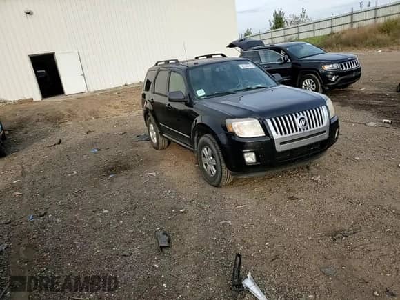 2011 Mercury Mariner with VIN 4M2CN8B71BKJ02237, listed as a Copart auction lot 82500755 with 182,809 mi miles and Clean title. Bid and sale history available at DreamBid. Image 14.