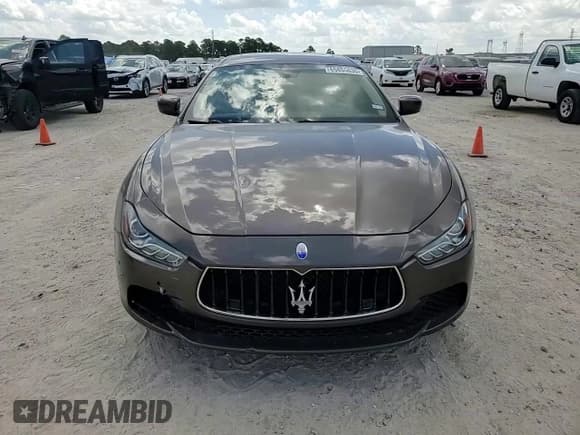 ✅ 2016 Maserati Ghibli • VIN: ZAM57XSA0G1191483 • Lot: 65855635. Wystawiony na Copart z przebiegiem 61 167 mil. Bezpłatny archiwum sprzedaży aukcyjnych z USA i szczegółowy raport historii pojazdu na DreamBid. Zdjęcie 13.