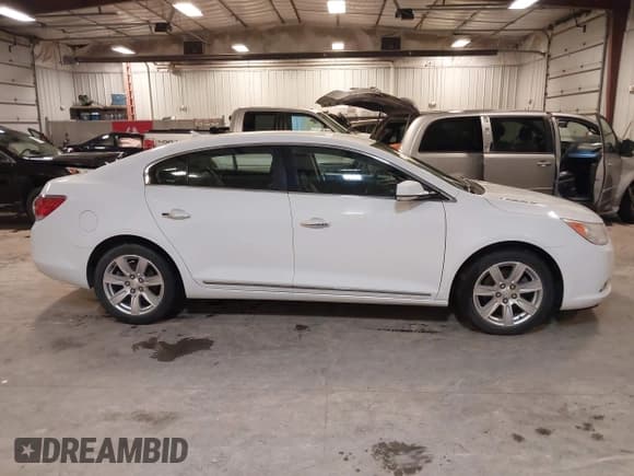 ✅ 2013 Buick LaCrosse Leather • VIN: 1G4GC5E37DF120348 • Lot: 43784431. Wystawiony na IAAI z przebiegiem 99 216 mil. Bezpłatny archiwum sprzedaży aukcyjnych z USA i szczegółowy raport historii pojazdu na DreamBid. Zdjęcie 13.