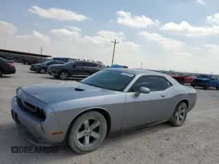2014 Dodge Challenger SXT z VIN 2C3CDYAG7EH231853, wystawiony jako Copart lot #57032924 z przebiegiem 160 093 mil mil oraz Szkoda całkowita • Salvage title. Historia ofert i sprzedaży dostępna na DreamBid. Obrazek 1.