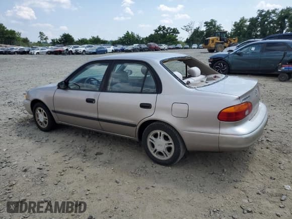 ✅ 2000 Chevrolet Prizm • VIN: 1Y1SK5487YZ408093 • Lot: 65705355. Listed on Copart with 143,283 mi. Free auction sales archive from the USA and detailed vehicle history report at DreamBid. Image 2.