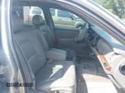 ✅ 2003 Buick Park Avenue • VIN: 1G4CW54KX34130820 • Lot: 42891867. Wystawiony na IAAI z przebiegiem 129 878 mil. Bezpłatny archiwum sprzedaży aukcyjnych z USA i szczegółowy raport historii pojazdu na DreamBid. Zdjęcie 5.