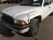 ✅ 2004 Dodge Dakota Sport • VIN: 1D7HG32N64S513715 • Lot: 42103367. Wystawiony na IAAI z przebiegiem Nie podano. Bezpłatny archiwum sprzedaży aukcyjnych z USA i szczegółowy raport historii pojazdu na DreamBid. Zdjęcie 6.