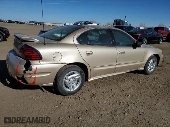 ✅ 2003 Pontiac Grand Am SE • VIN: 1G2NE52F13C106373 • Lot: 85140355. Listed on Copart with 114,104 mi. Free auction sales archive from the USA and detailed vehicle history report at DreamBid. Image 3.