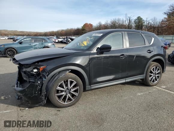 ✅ 2018 Mazda CX-5 Touring • VIN: JM3KFBCM6J0316738 • Lot: 90633555. Wystawiony na Copart z przebiegiem 113 332 mil. Bezpłatny archiwum sprzedaży aukcyjnych z USA i szczegółowy raport historii pojazdu na DreamBid. Zdjęcie 1.