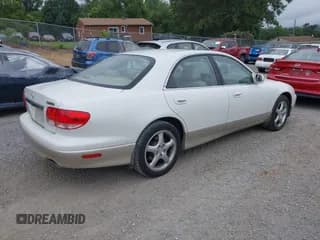 ✅ 2001 Mazda Millenia S • VIN: JM1TA222511713119 • Lot: 43030341. Wystawiony na IAAI z przebiegiem 76 718 mil. Bezpłatny archiwum sprzedaży aukcyjnych z USA i szczegółowy raport historii pojazdu na DreamBid. Zdjęcie 4.