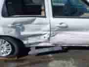 2005 Mercury Mariner Luxury z VIN 4M2CU56165DJ21267, wystawiony jako IAAI lot #41934003 z przebiegiem Nie podano mil oraz . Historia ofert i sprzedaży dostępna na DreamBid. Obrazek 16.