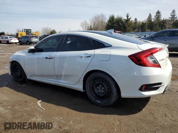 ✅ 2019 Honda Civic Touring • VIN: 2HGFC1F9XKH105318 • Лот: 51439745. Опубликован ранее на Copart с пробегом 205 521 миль. Бесплатный доступ к архиву аукционных продаж из США и подробный отчёт об истории автомобиля на DreamBid. Изображение 2.