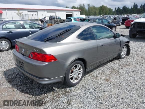 ✅ 2005 Acura RSX • VIN: JH4DC54815S014859 • Lot: 42541893. Listed on IAAI with 103,520 mi. Free auction sales archive from the USA and detailed vehicle history report at DreamBid. Image 4.