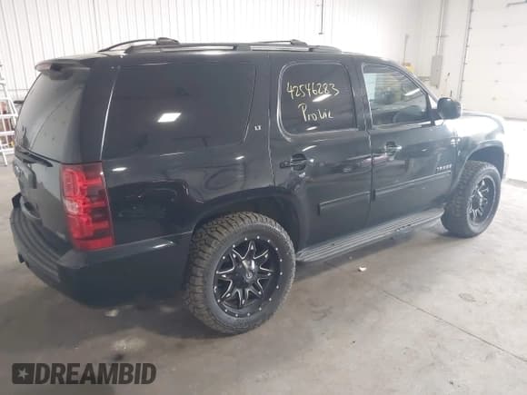✅ 2014 Chevrolet Tahoe LT • VIN: 1GNSCBE07ER249202 • Lot: 42546283. Listed on IAAI with 124,538 mi. Free auction sales archive from the USA and detailed vehicle history report at DreamBid. Image 4.