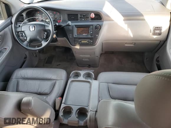 ✅ 2004 Honda Odyssey EX-L • VIN: 5FNRL18704B005034 • Lot: 85877315. Listed on Copart with 128,306 mi. Free auction sales archive from the USA and detailed vehicle history report at DreamBid. Image 8.