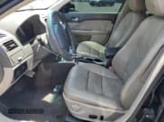 ✅ 2010 Ford Fusion Hybrid • VIN: 3FADP0L33AR185719 • Лот: 59821115. Опубликован ранее на Copart с пробегом 154 019 миль. Бесплатный доступ к архиву аукционных продаж из США и подробный отчёт об истории автомобиля на DreamBid. Изображение 7.