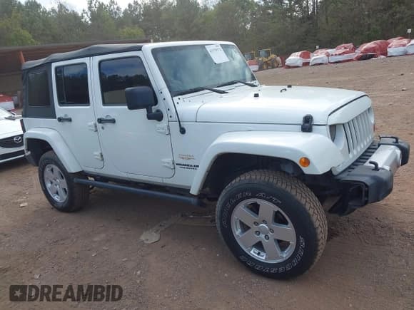 ✅ 2012 Jeep Wrangler Unlimited Sahara • VIN: 1C4HJWEG3CL252370 • Lot: 43379374. Wystawiony na IAAI z przebiegiem 219 023 mil. Bezpłatny archiwum sprzedaży aukcyjnych z USA i szczegółowy raport historii pojazdu na DreamBid. Zdjęcie 13.