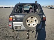 ✅ 1998 Toyota RAV4 • VIN: JT3HP10V1W7102654 • Lot: 81884535. Listed on Copart with Not provided. Free auction sales archive from the USA and detailed vehicle history report at DreamBid. Image 6.