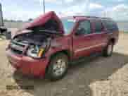 2010 Chevrolet Suburban LT z VIN 1GNUKJE30AR244983, wystawiony jako Copart lot #61648495 z przebiegiem 154 958 mil mil oraz Szkoda całkowita • Salvage title. Historia ofert i sprzedaży dostępna na DreamBid. Obrazek 1.