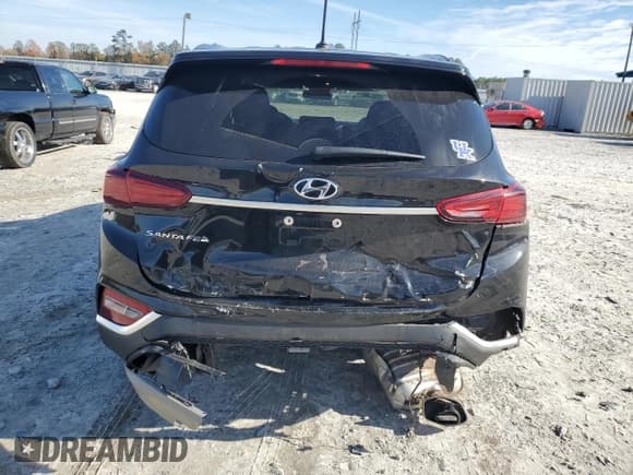 ✅ 2020 Hyundai Santa Fe SE • VIN: 5NMS23AD8LH251617 • Lot: 76453953. Wystawiony na Copart z przebiegiem 63 080 mil. Bezpłatny archiwum sprzedaży aukcyjnych z USA i szczegółowy raport historii pojazdu na DreamBid. Zdjęcie 6.