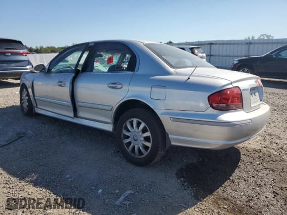 ✅ 2003 Hyundai Sonata GLS • VIN: KMHWF35H03A891295 • Лот: 80393135. Опубликован ранее на Copart с пробегом Не указан. Бесплатный доступ к архиву аукционных продаж из США и подробный отчёт об истории автомобиля на DreamBid. Изображение 2.