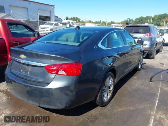 ✅ 2014 Chevrolet Impala LT • VIN: 2G1115SLXE9193219 • Lot: 43448513. Listed on IAAI with 224,522 mi. Free auction sales archive from the USA and detailed vehicle history report at DreamBid. Image 4.