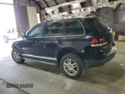 ✅ 2010 Volkswagen Touareg VR6 • VIN: WVGBF7A99AD002591 • Lot: 70624234. Listed on Copart with 154,330 mi. Free auction sales archive from the USA and detailed vehicle history report at DreamBid. Image 2.