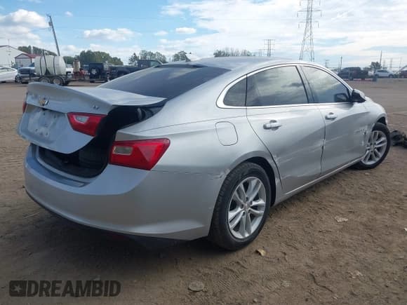 ✅ 2017 Chevrolet Malibu LT • VIN: 1G1ZE5ST3HF205245 • Lot: 43440387. Listed on IAAI with 143,471 mi. Free auction sales archive from the USA and detailed vehicle history report at DreamBid. Image 4.