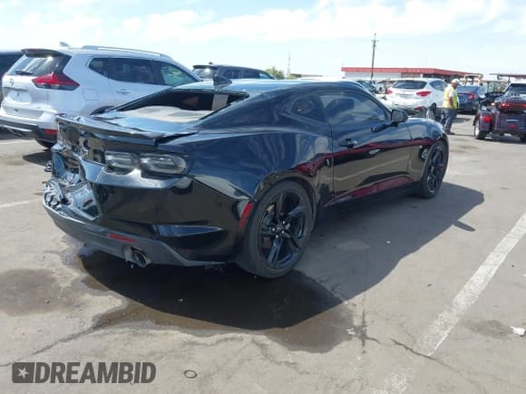 ✅ 2022 Chevrolet Camaro 1LT • VIN: 1G1FB1RX8N0133146 • Lot: 42169340. Listed on IAAI with 40,723 mi. Free auction sales archive from the USA and detailed vehicle history report at DreamBid. Image 4.