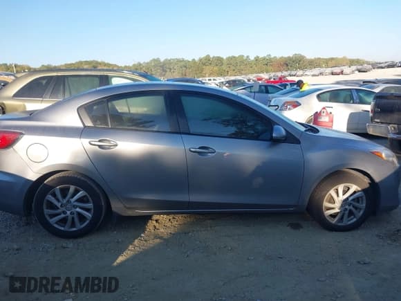 ✅ 2012 Mazda 3 i Touring • VIN: JM1BL1V7XC1550980 • Lot: 43473671. Listed on IAAI with 96,476 mi. Free auction sales archive from the USA and detailed vehicle history report at DreamBid. Image 13.