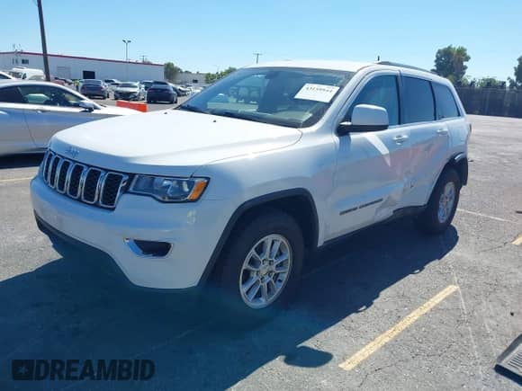 2020 Jeep Grand Cherokee Altitude z VIN 1C4RJEAG1LC181593, wystawiony jako IAAI lot #43159944 z przebiegiem 44 007 mil mil oraz . Historia ofert i sprzedaży dostępna na DreamBid. Obrazek 17.