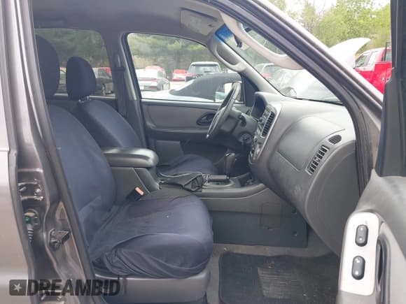 ✅ 2005 Ford Escape XLT • VIN: 1FMYU93185DA12392 • Lot: 42307875. Listed on IAAI with 187,239 mi. Free auction sales archive from the USA and detailed vehicle history report at DreamBid. Image 5.