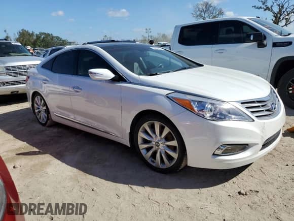 2013 Hyundai Azera z VIN KMHFH4JG3DA215115, wystawiony jako Copart lot #75914224 z przebiegiem Nie podano mil oraz Szkoda całkowita • Salvage title. Historia ofert i sprzedaży dostępna na DreamBid. Obrazek 4.