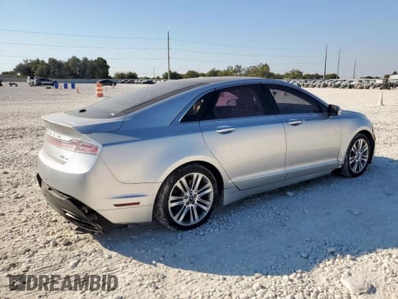 ✅ 2014 Lincoln MKZ • VIN: 3LN6L2G92ER801131 • Lot: 86784405. Wystawiony na Copart z przebiegiem 256 380 mil. Bezpłatny archiwum sprzedaży aukcyjnych z USA i szczegółowy raport historii pojazdu na DreamBid. Zdjęcie 3.
