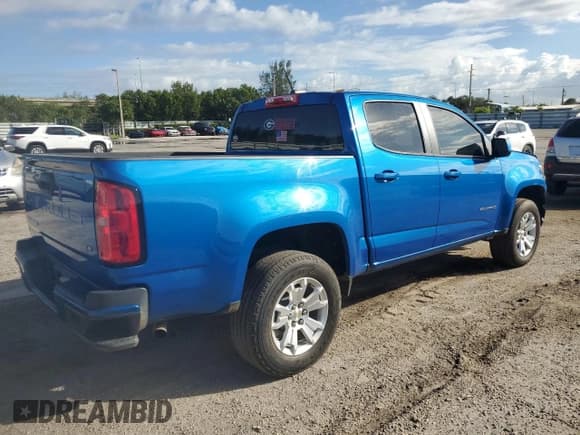 ✅ 2021 Chevrolet Colorado 2WD LT • VIN: 1GCGSCEN4M1141362 • Лот: 77847684. Опубликован ранее на Copart с пробегом 104 143 миль. Бесплатный доступ к архиву аукционных продаж из США и подробный отчёт об истории автомобиля на DreamBid. Изображение 3.