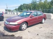 ✅ 2001 Nissan Altima GLE • VIN: 1N4DL01A21C124146 • Lot: 43014267. Listed on IAAI with 104,264 mi. Free auction sales archive from the USA and detailed vehicle history report at DreamBid. Image 2.