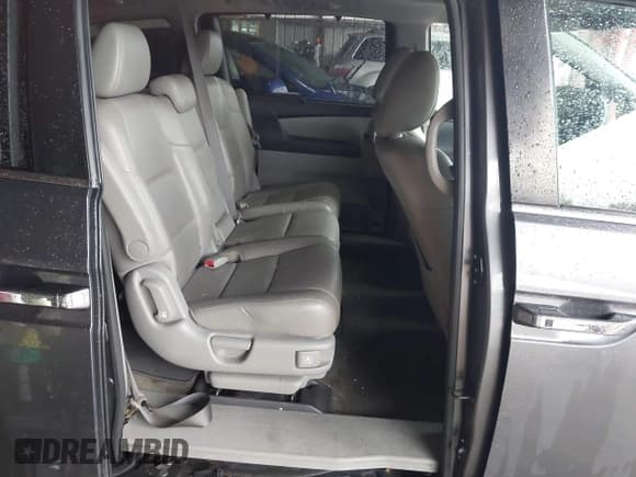 ✅ 2014 Honda Odyssey EX-L • VIN: 5FNRL5H65EB024517 • Lot: 43783038. Listed on IAAI with 195,775 mi. Free auction sales archive from the USA and detailed vehicle history report at DreamBid. Image 8.