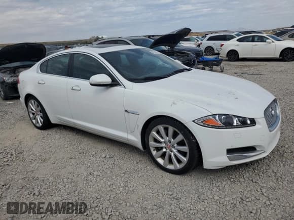 ✅ 2014 Jaguar XF SC • VIN: SAJWA0EX1E8U30868 • Лот: 69886735. Опубликован ранее на Copart с пробегом 66 922 миль. Бесплатный доступ к архиву аукционных продаж из США и подробный отчёт об истории автомобиля на DreamBid. Изображение 4.