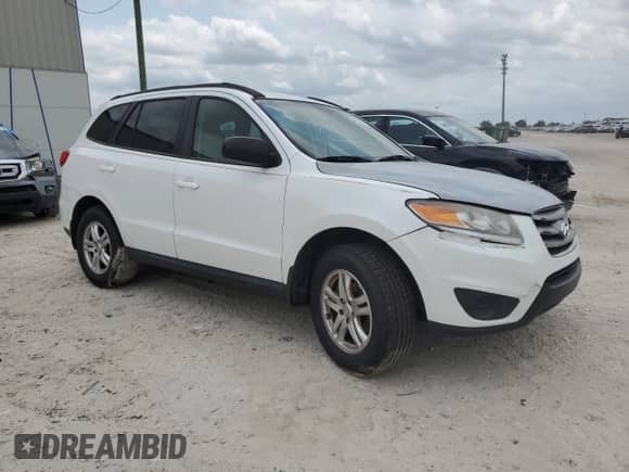 2012 Hyundai Santa Fe GLS с VIN 5XYZG3AB6CG157258, выставлен на аукционе Copart как лот 54052354 с пробегом 223 325 миль миль и На запчасти • Non repairable. История ставок и продаж доступна на DreamBid. Изображение 4.