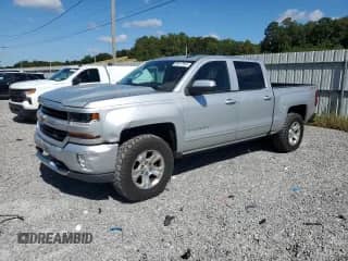 2017 Chevrolet Silverado 1500 LT с VIN 3GCUKREC7HG241595, выставлен на аукционе Copart как лот 69917625 с пробегом 128 393 миль миль и Списание • Salvage title. История ставок и продаж доступна на DreamBid. Изображение 1.