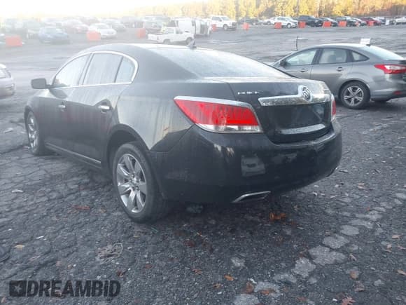 ✅ 2013 Buick LaCrosse Leather • VIN: 1G4GC5E36DF275215 • Лот: 43569582. Опубликован ранее на IAAI с пробегом 206 884 миль. Бесплатный доступ к архиву аукционных продаж из США и подробный отчёт об истории автомобиля на DreamBid. Изображение 3.