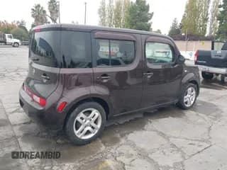 ✅ 2009 Nissan Cube SL • VIN: JN8AZ28R29T103087 • Lot: 43590759. Wystawiony na IAAI z przebiegiem 187 841 mil. Bezpłatny archiwum sprzedaży aukcyjnych z USA i szczegółowy raport historii pojazdu na DreamBid. Zdjęcie 4.