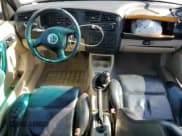 ✅ 1999 Volkswagen Cabriolet GLS • VIN: 3VWDB61E5XM810088 • Лот: 69466225. Опубликован ранее на Copart с пробегом 176 571 миль. Бесплатный доступ к архиву аукционных продаж из США и подробный отчёт об истории автомобиля на DreamBid. Изображение 8.