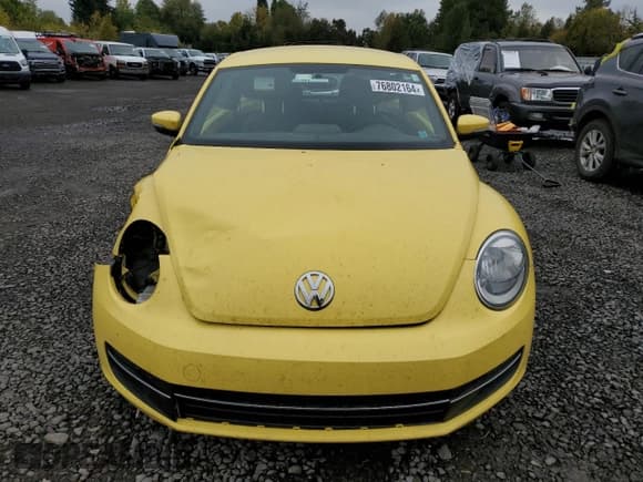 ✅ 2014 Volkswagen Beetle 2.0L TDI • VIN: 3VWJL7AT0EM609099 • Лот: 76802164. Опубликован ранее на Copart с пробегом Не указан. Бесплатный доступ к архиву аукционных продаж из США и подробный отчёт об истории автомобиля на DreamBid. Изображение 5.