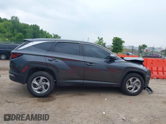 ✅ 2022 Hyundai Tucson SE • VIN: 5NMJACAE0NH031768 • Lot: 42504229. Wystawiony na IAAI z przebiegiem 95 106 mil. Bezpłatny archiwum sprzedaży aukcyjnych z USA i szczegółowy raport historii pojazdu na DreamBid. Zdjęcie 13.