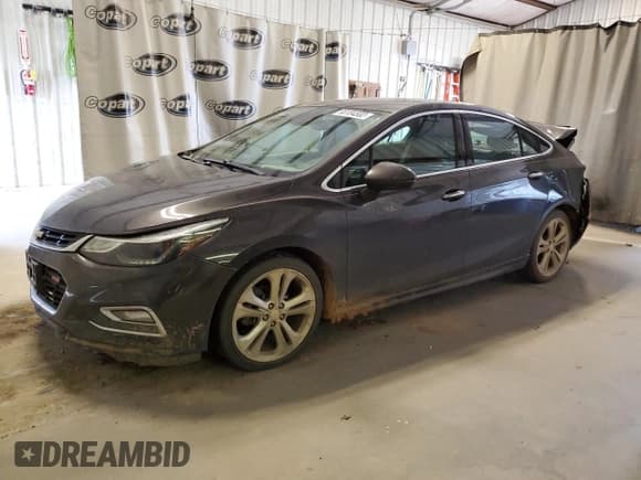 ✅ 2017 Chevrolet Cruze Premier • VIN: 1G1BF5SM9H7118449 • Lot: 68184502. Listed on Copart with 96,367 mi. Free auction sales archive from the USA and detailed vehicle history report at DreamBid. Image 1.