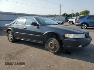 ✅ 2002 Cadillac Seville Touring STS • VIN: 1G6KY54922U210928 • Lot: 71214564. Wystawiony na Copart z przebiegiem Nie podano. Bezpłatny archiwum sprzedaży aukcyjnych z USA i szczegółowy raport historii pojazdu na DreamBid. Zdjęcie 4.