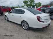 ✅ 2015 Lincoln MKS EcoBoost • VIN: 1LNHL9FT0FG604000 • Lot: 42369003. Listed on IAAI with 83,590 mi. Free auction sales archive from the USA and detailed vehicle history report at DreamBid. Image 3.