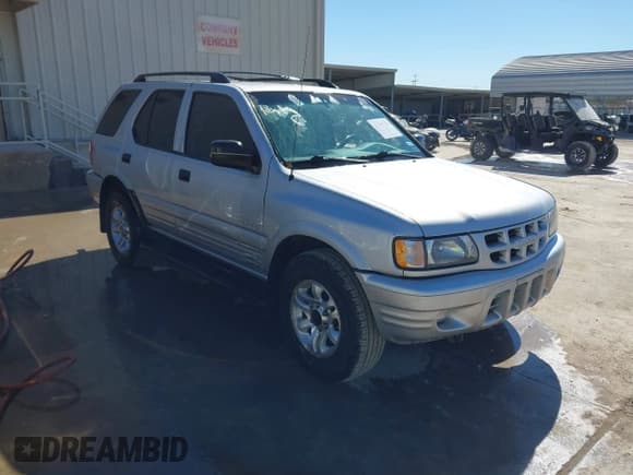 ✅ 2002 Isuzu Rodeo S • VIN: 4S2CK58WX24321556 • Lot: 41405981. Listed on IAAI with 172,590 mi. Free auction sales archive from the USA and detailed vehicle history report at DreamBid. Image 1.